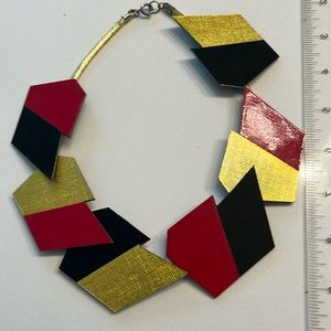 Mid century modern necklace, signed by the artist in gold paint